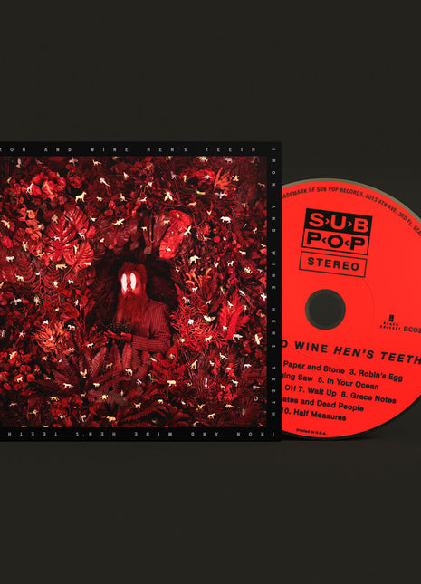 the album cover for Iron & Wine - Hen's Teeth