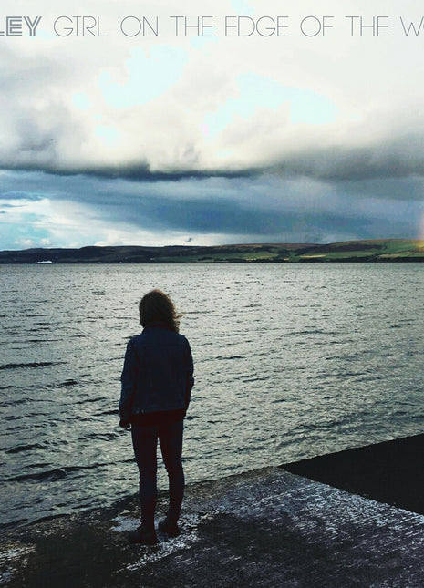 the album cover for Keeley - Girl On The Edge Of The World