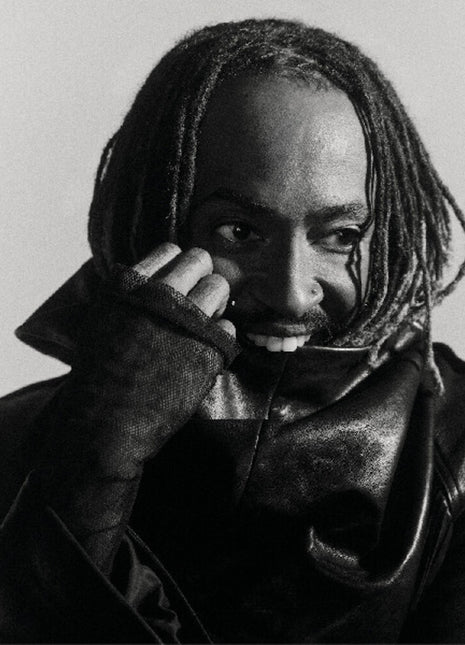 the album cover for Thundercat - Distracted [Indie Exclusive Black Marbled Smoke Effect]