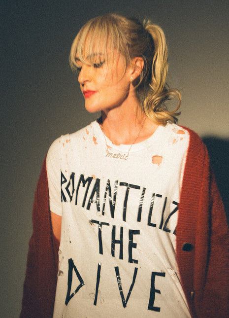 the album cover for Metric - Romanticize The Dive [Indie Exclusive]