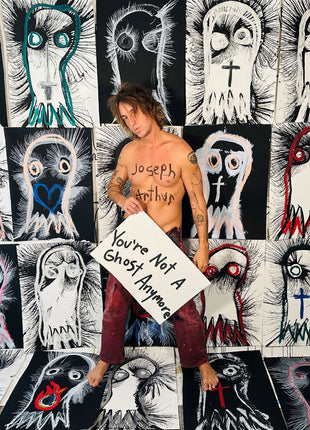 the album cover for Joseph Arthur - You're Not A Ghost Anymore