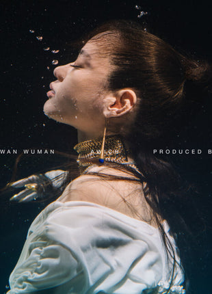 the album cover for Awich - Okinawan Wuman [Clear Vinyl]