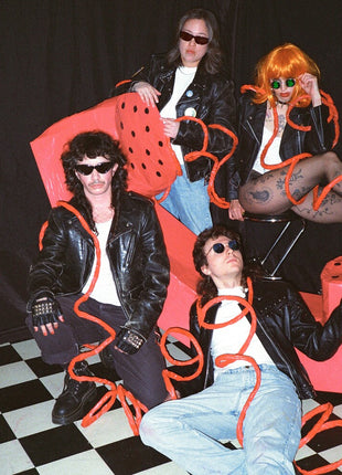 the album cover for Sux - Sux Sells [Colored Vinyl] (Red) [With Booklet]