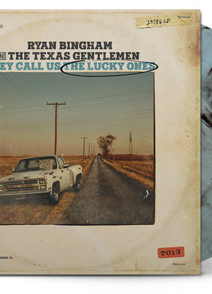 the album cover for Ryan Bingham - They Call Us The Lucky Ones [Indie Exclusive Electric Smoke]