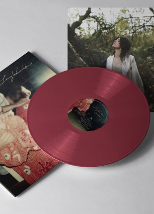 the album cover for Jesca Hoop - Long Wave Home - Oxblood Vinyl [Colored Vinyl] (Auto) (Uk)