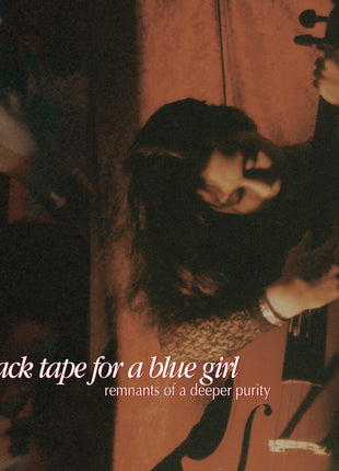 the album cover for Black Tape For A Blue Girl - Remnants Of A Deeper Purity (Aniv)