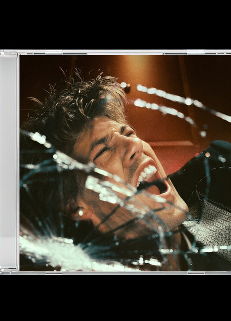 the album cover for Ruel - Kicking My Feet & Screaming