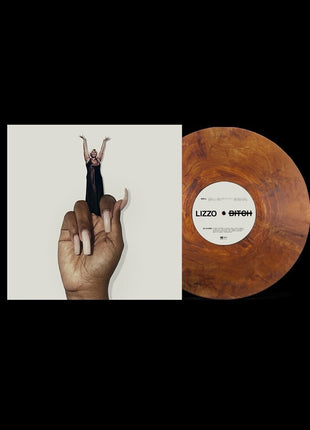 the album cover for Lizzo - BITCH [Indie Exclusive Copper Black Ice]