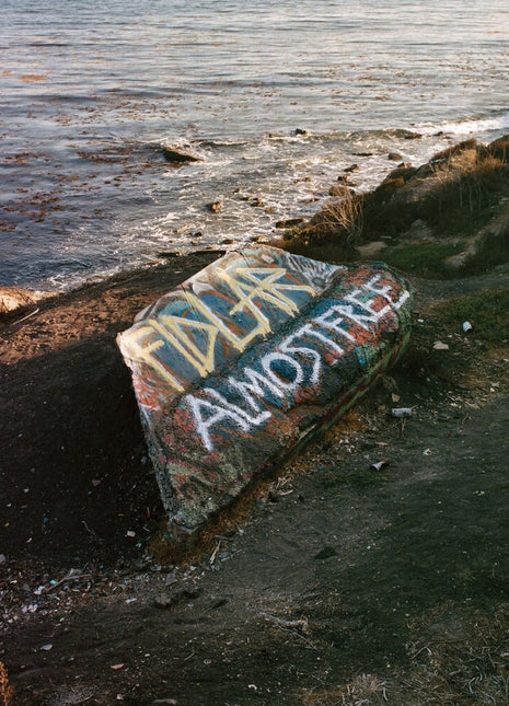 the album cover for FIDLAR - Almost Free - Frosted Yellow [Colored Vinyl] (Ylw)