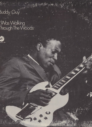 the album cover for Buddy Guy - I Was Walking Through The Woods [180 Gram]