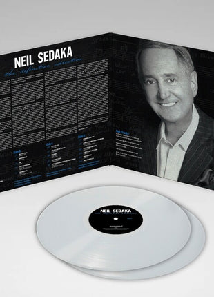 the album cover for Neil Sedaka - Definitive Collection [Colored Vinyl] (Wht)