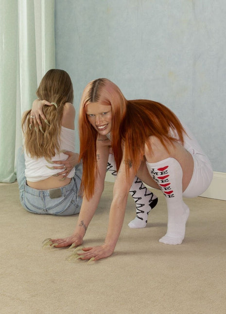 the album cover for Wet Leg - Moisturizer - Baby Pink Vinyl [Colored Vinyl] (Pnk)