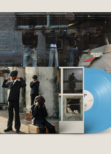 the album cover for Ezra Collective - Here Because Of Hope [Translucent Blue]