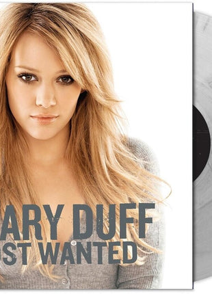 the album cover for Hilary Duff - Most Wanted [Metallic Silver/Black]