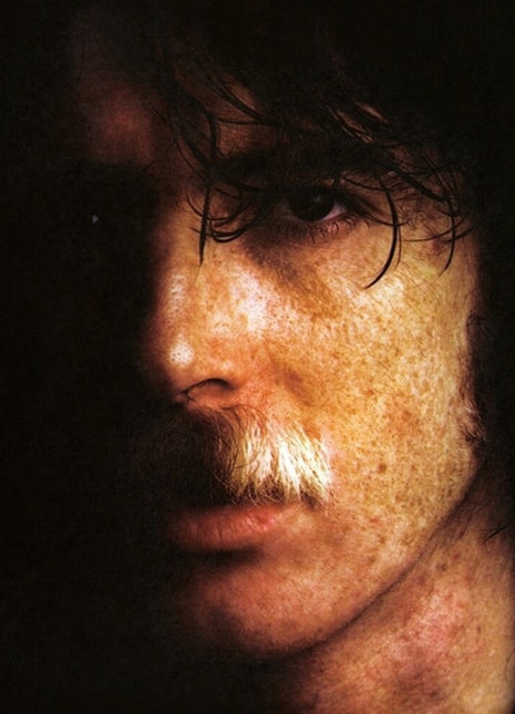 the album cover for Charly Garcia - Yendo De La Cama Al Living