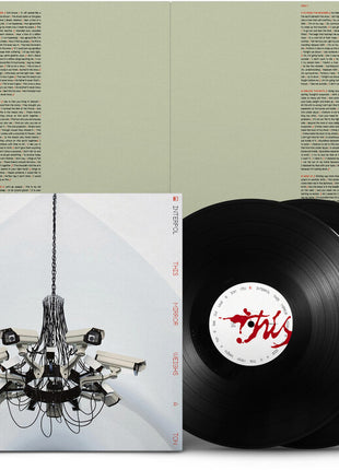 the album cover for Interpol - This Mirror Weighs a Ton [Black]