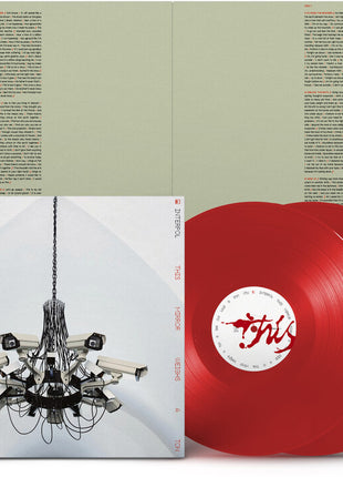 the album cover for Interpol - This Mirror Weighs a Ton [Indie Exclusive Transparent Red]
