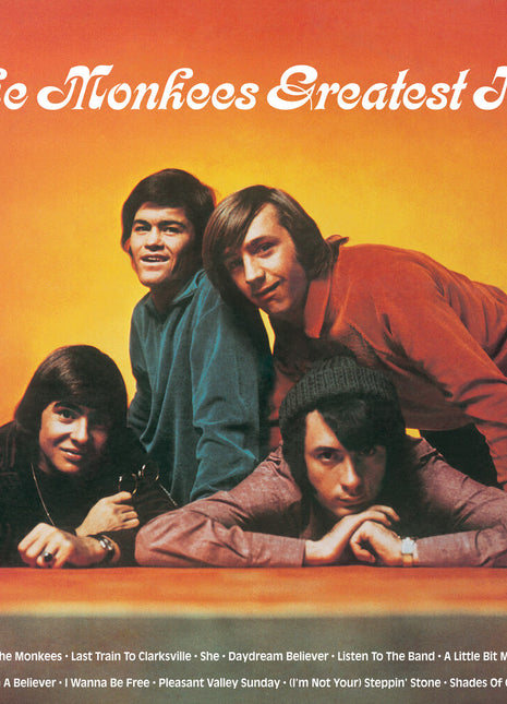 the album cover for Monkees - Greatest Hits (yellow Flame W/ Sticker Pack) (brick & Mortar Exclusive)