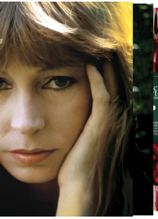 the album cover for Juice Newton - Angel Of The Morning - The Very Best Of [Black Clear Red Splatter]