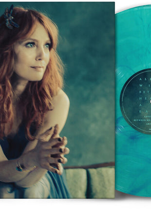 the album cover for Alicia Witt - Between Heaven and Earth
