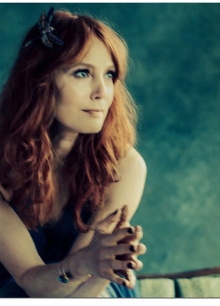 the album cover for Alicia Witt - Between Heaven and Earth