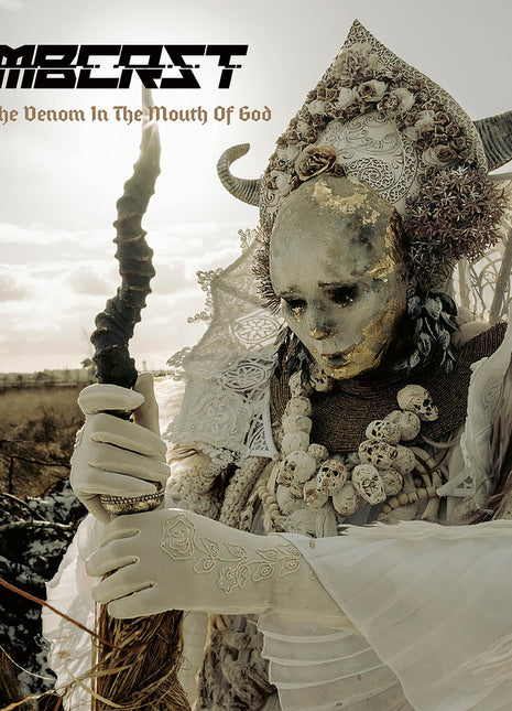 the album cover for Combichrist - The Venom in the Mouth of God