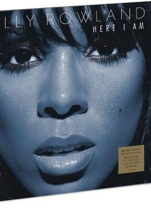 the album cover for Kelly Rowland - Here I Am