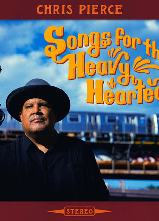 the album cover for Chris Pierce - Songs For The Heavy Hearted