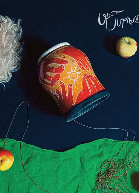 the album cover for Hands Free - Upturned Cup