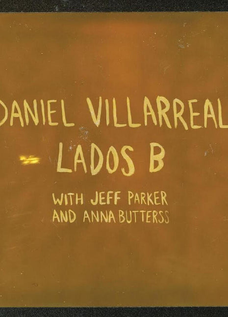 the album cover for Daniel Villarreal - Lados B - Orange [Colored Vinyl] (Ofgv) (Org)
