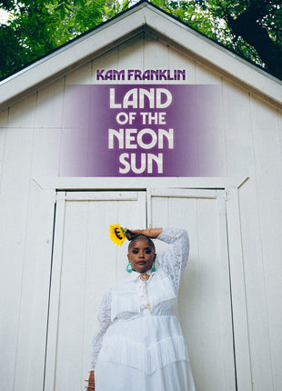 the album cover for Kam Franklin - Land of the Neon Sun