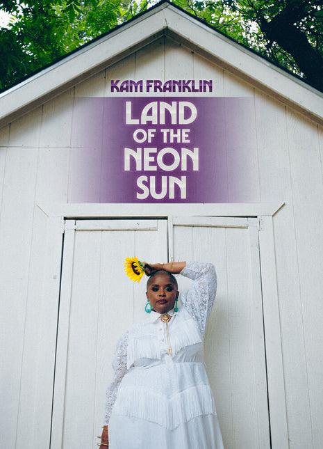 the album cover for Kam Franklin - Land of the Neon Sun