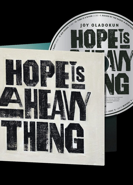 the album cover for Joy Oladokun - Hope Is A Heavy Thing