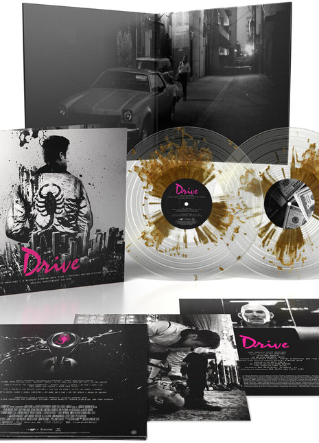 the album cover for Cliff Martinez - Drive: Original Motion Picture Soundtrack - 15th Anniversary [Gold Splatter On Clear]