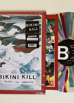 the album cover for Bikini Kill - Reject All American [Colored Vinyl] (Aniv) [Reissue] (Spla)