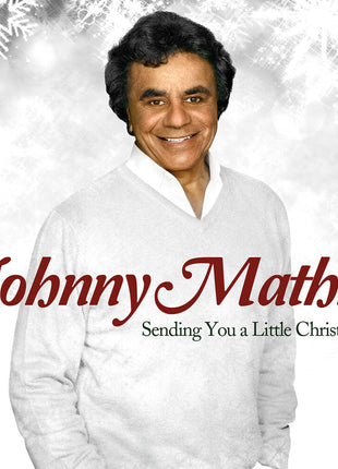 the album cover for Johnny Mathis - Sending You A Little Christmas [Colored Vinyl] [Limited Edition] (Wht)