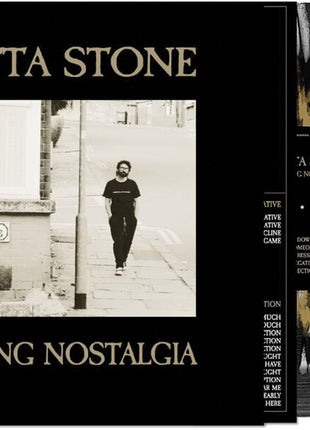the album cover for Rosetta Stone - Executing Nostalgia [Black/Gold/White Splatter]