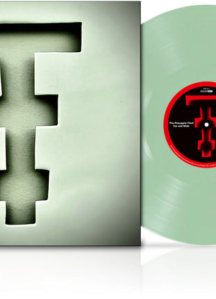the album cover for The Pineapple Thief - Far And Wide [Translucent Coke Bottle]
