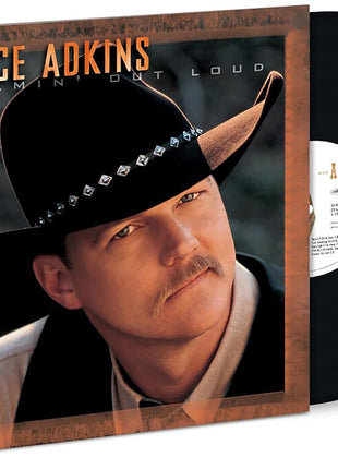 the album cover for Trace Adkins - Dreamin Out Loud (Aniv)