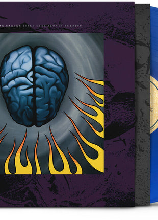 the album cover for Tear Garden - Tired Eyes Slowly Burning (Blue) [Colored Vinyl] (Ofgv)