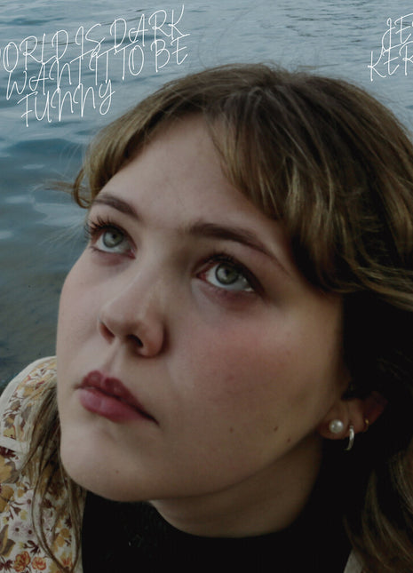 the album cover for Jess Kerber - World Is Dark But I Want It To Be Funny [Colored Vinyl]