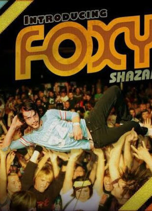 the album cover for Foxy Shazam - Introducing (Foxy Shazam) (Blk) (Blue) [Colored Vinyl]