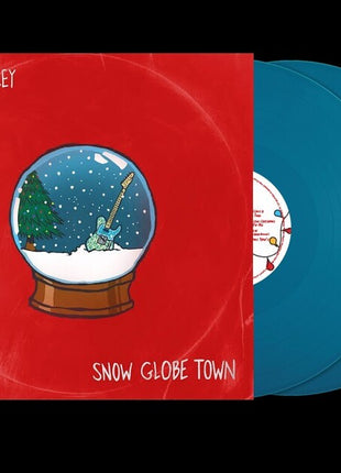 the album cover for Brad Paisley - Snow Globe Town [Aqua]