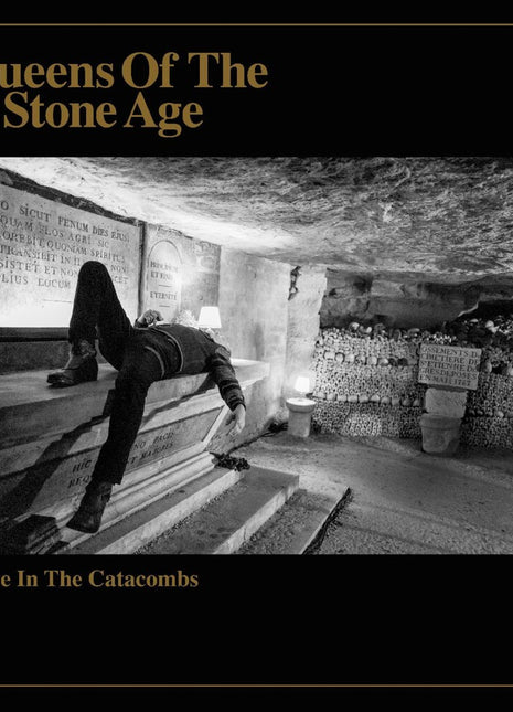 the album cover for Queens Of The Stone Age - Alive In The Catacombs