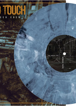 the album cover for Wounded Touch - They Promised Eden (Blk) [Colored Vinyl] (Ltbl) (Wht)