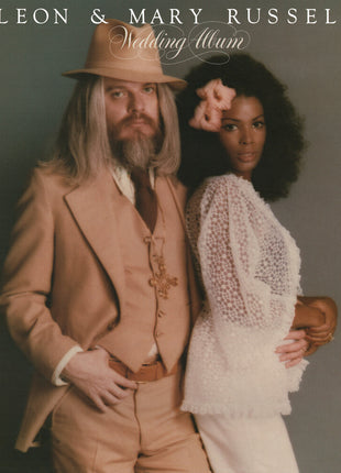 the album cover for Leon Russell - Wedding Album [Clear Vinyl] (Gol) (Aniv)