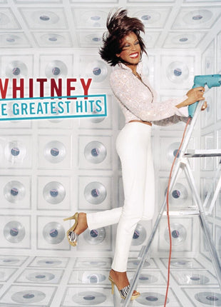 the album cover for Whitney Houston - Whitney the Greatest Hits