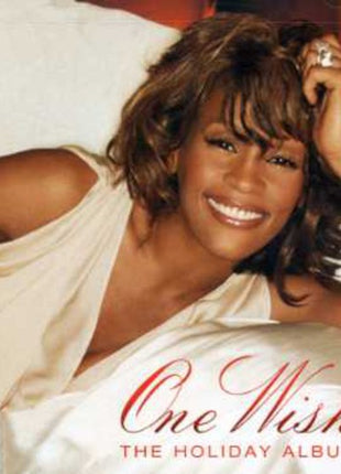 the album cover for Whitney Houston - One Wish (The Holiday Album)